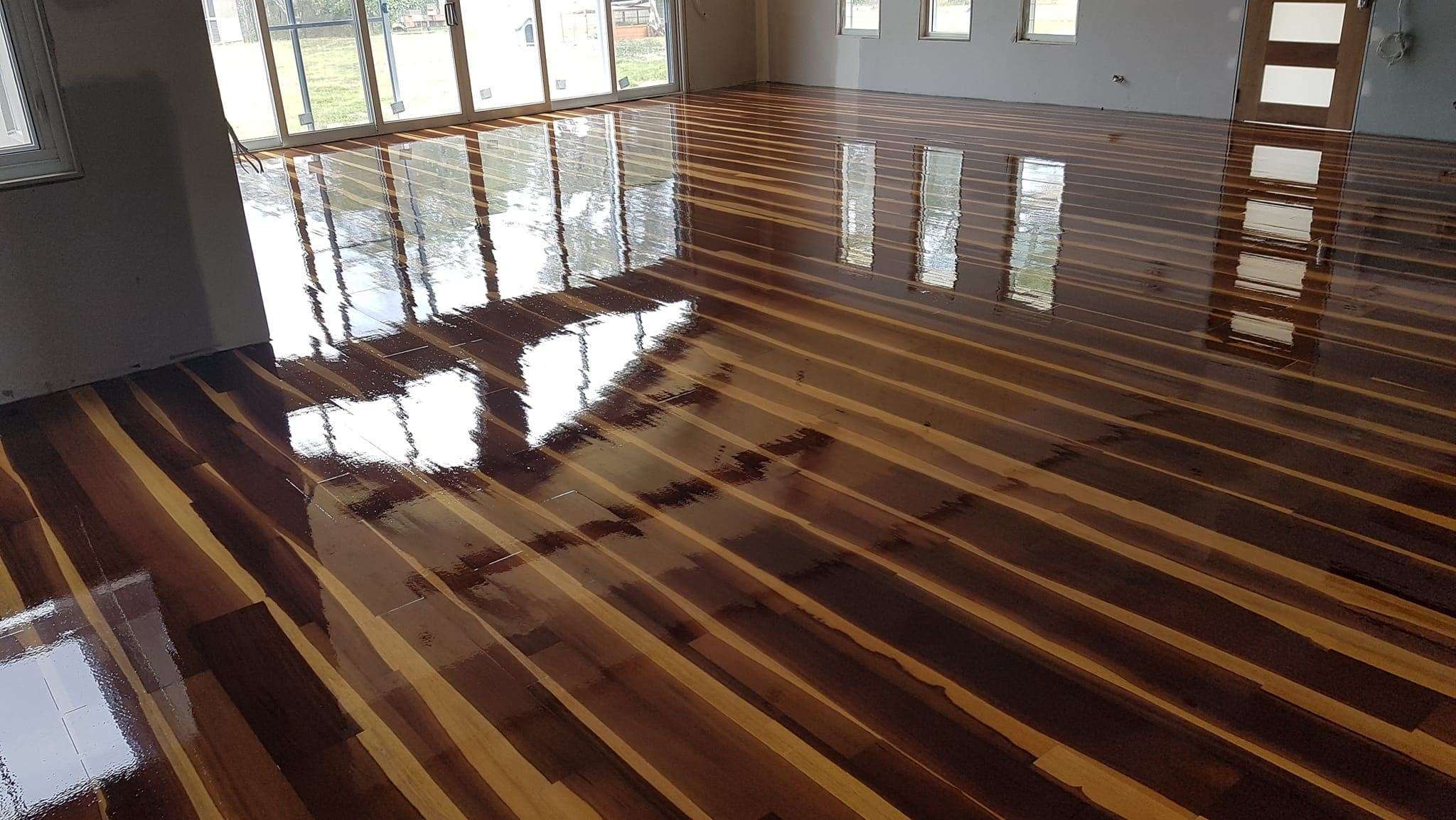 Glossy polished timber floor in a Sydney home — restored by ATA Flooring Sydney