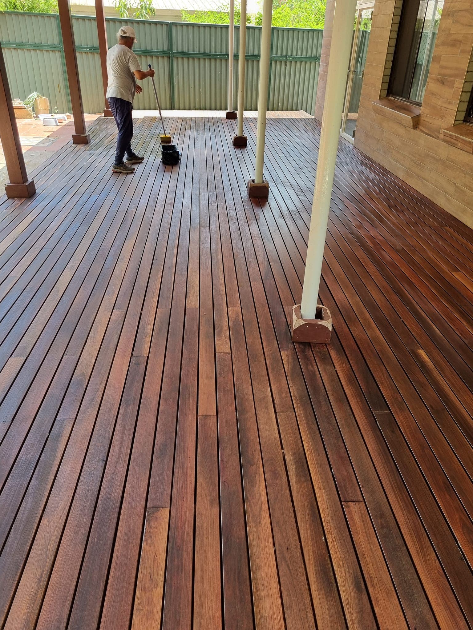 Outdoor timber deck freshly oiled in a Sydney backyard